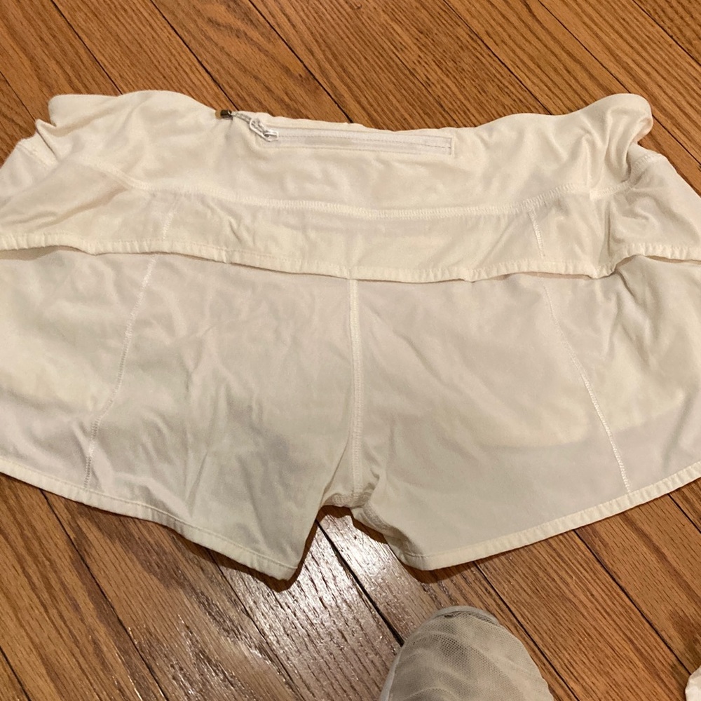 Lululemon white speedy running shorts.